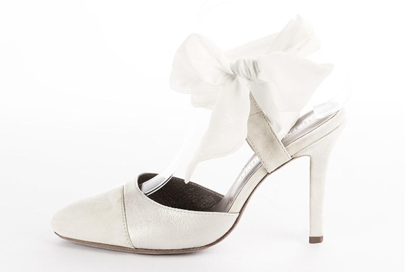 French elegance and refinement for these off white dress open back shoes, with an ankle scarf, 
                available in many subtle leather and colour combinations. This pretty wedding pump will sublimate your leg with its scarf tied at the ankle.  
                Matching clutches for parties, ceremonies and weddings.   
                You can customize these shoes to perfectly match your tastes or needs, and have a unique model.  
                Choice of leathers, colours, knots and heels. 
                Wide range of materials and shades carefully chosen.  
                Rich collection of flat, low, mid and high heels.  
                Small and large shoe sizes - Florence KOOIJMAN